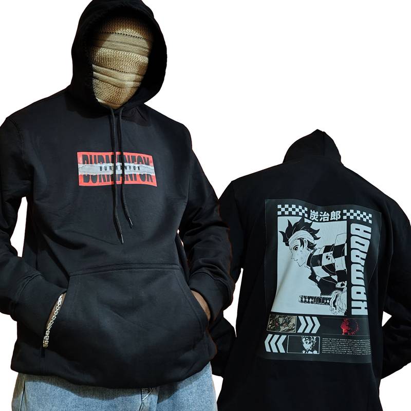 Black hoodie with red and white logo on front and character design on back, worn by a person.